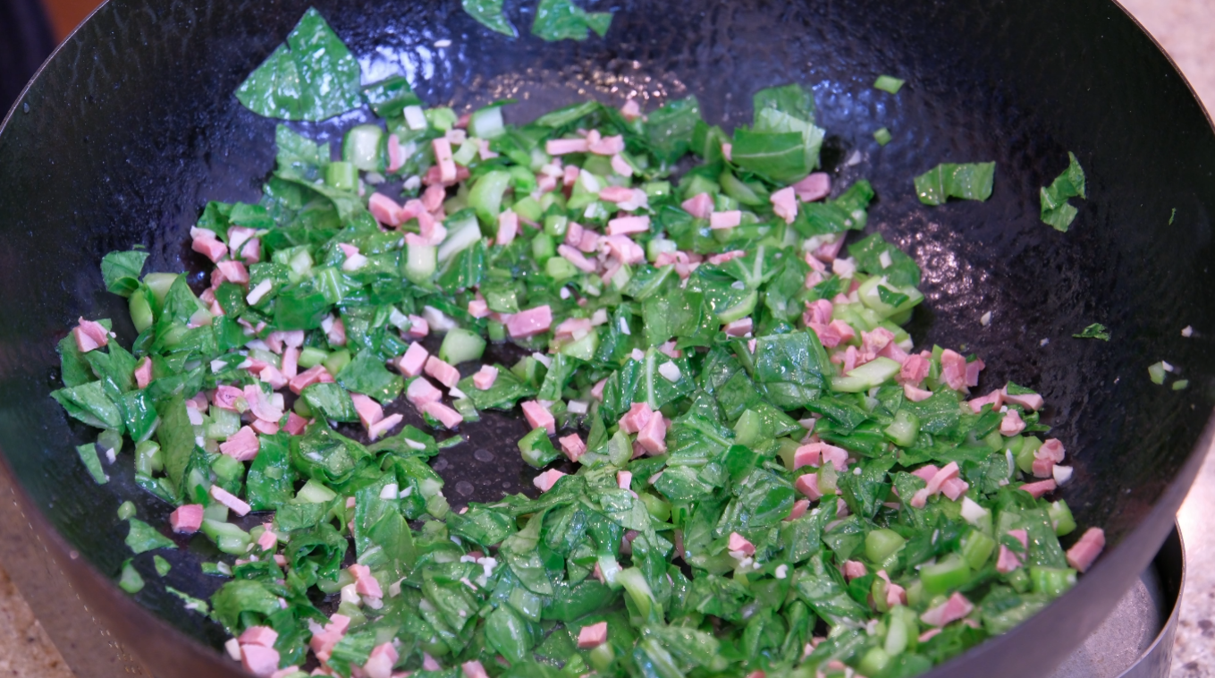 Image of Add the choy sum leaves and continue to stir until...