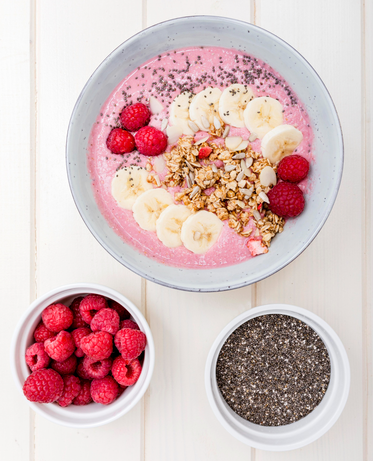 Granola with coconut yoghurt, raspberries and chia seeds