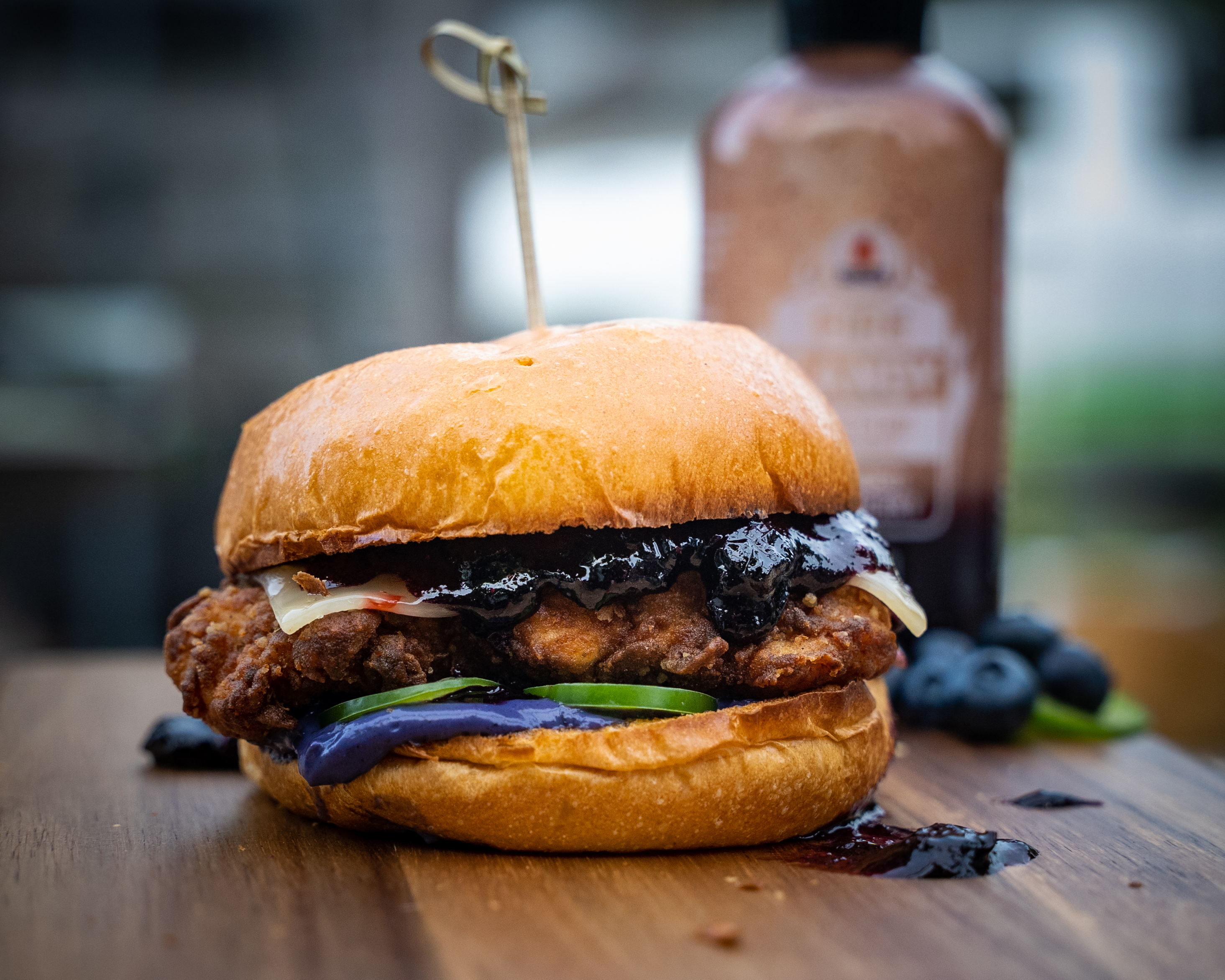 Image of On a brioche bun, put the blueberry sauce, fresh jalapeno,...