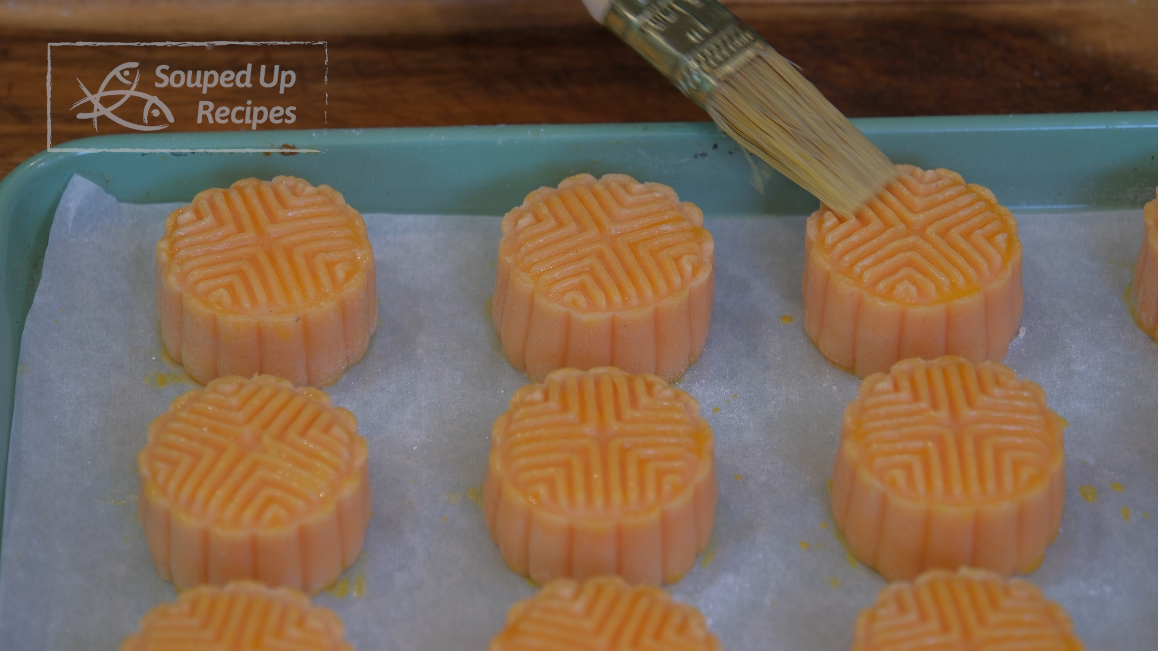 Image of Take the mooncakes out, and brush another layer of egg...