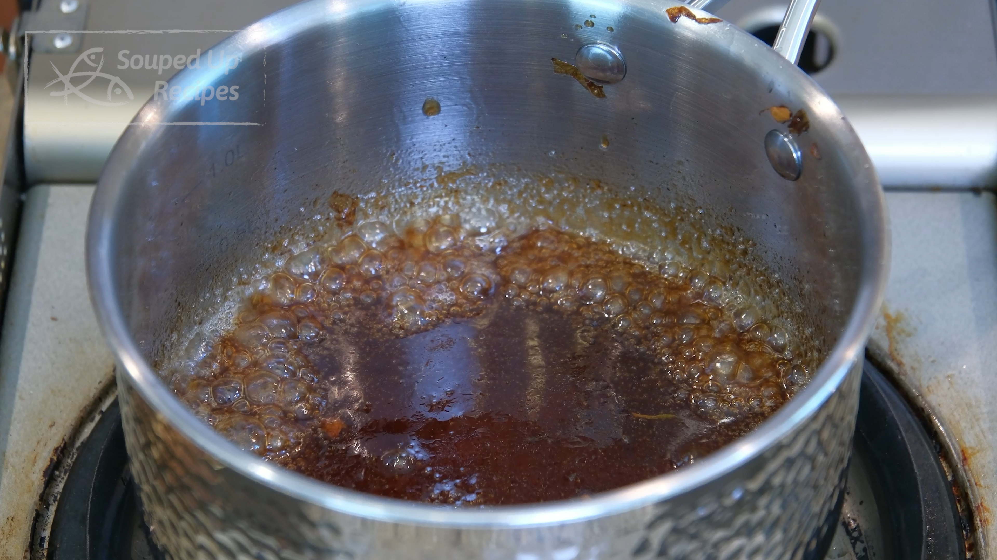 Image of Add the oil back to the pan long with soy...