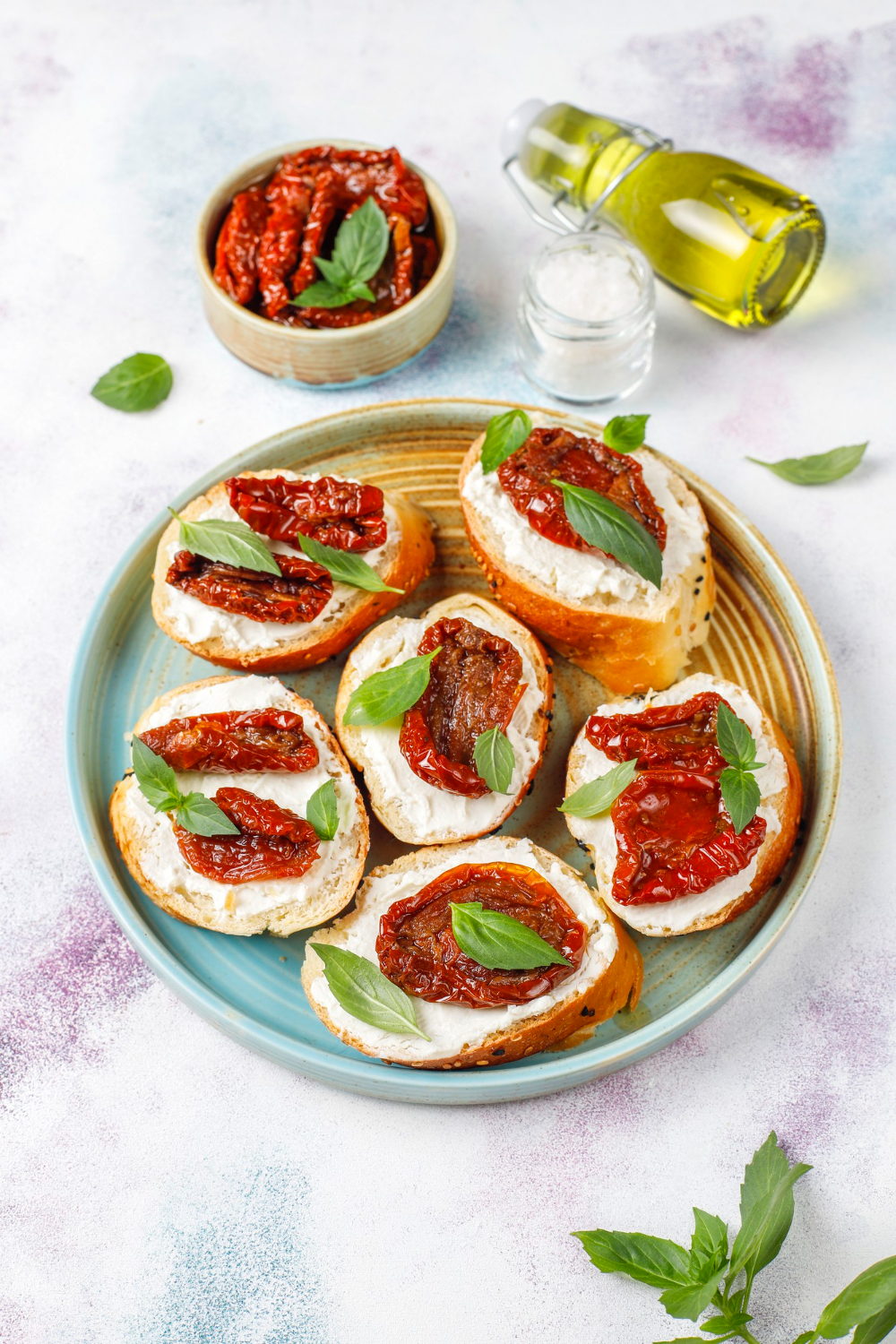 Toasts with almond cream cheese and dried tomatoes