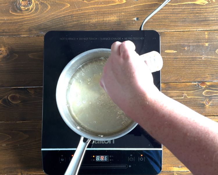 Image of In a heavy-bottom pot add the water, sugar, cinnamon sticks...