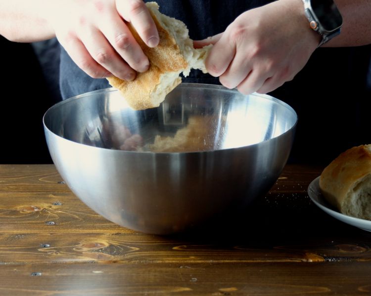 Image of Tear ½ loaf crusty country bread into 1½