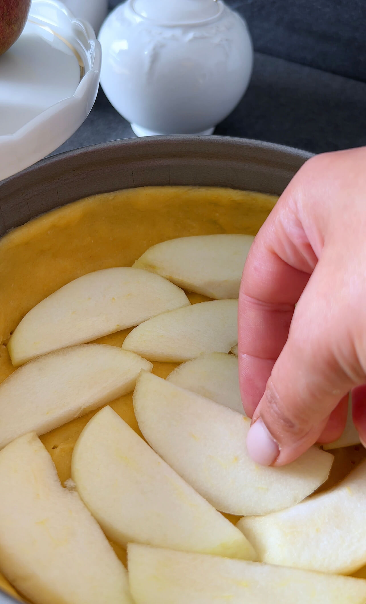 Image of Arrange the pear slices evenly over the pastry in the...