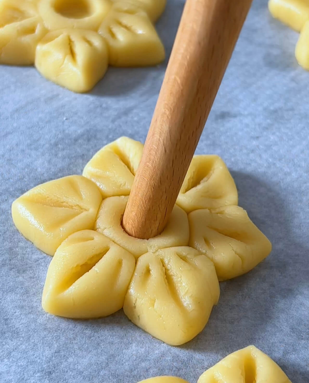 Image of Use a stick to create flower petals.