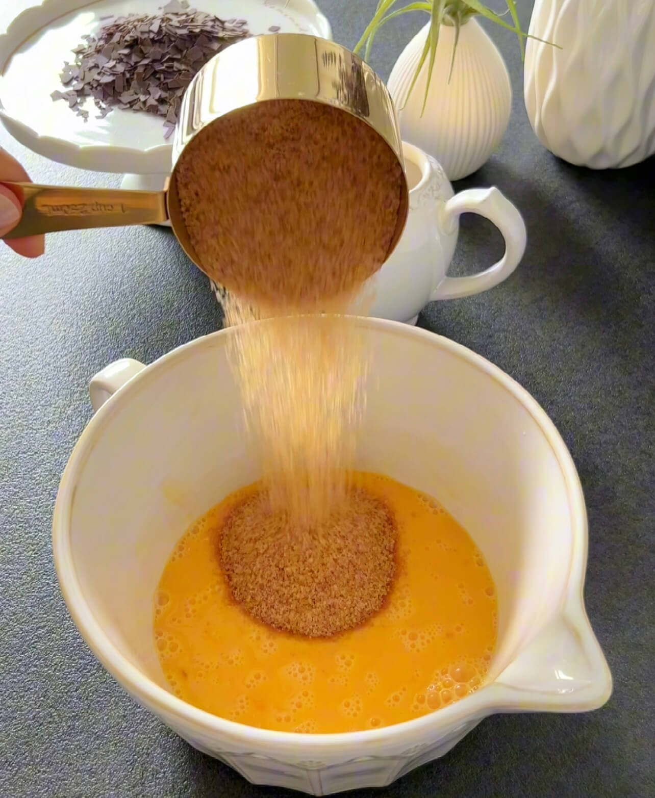 Image of Whisk the eggs and mix with brown sugar until well...