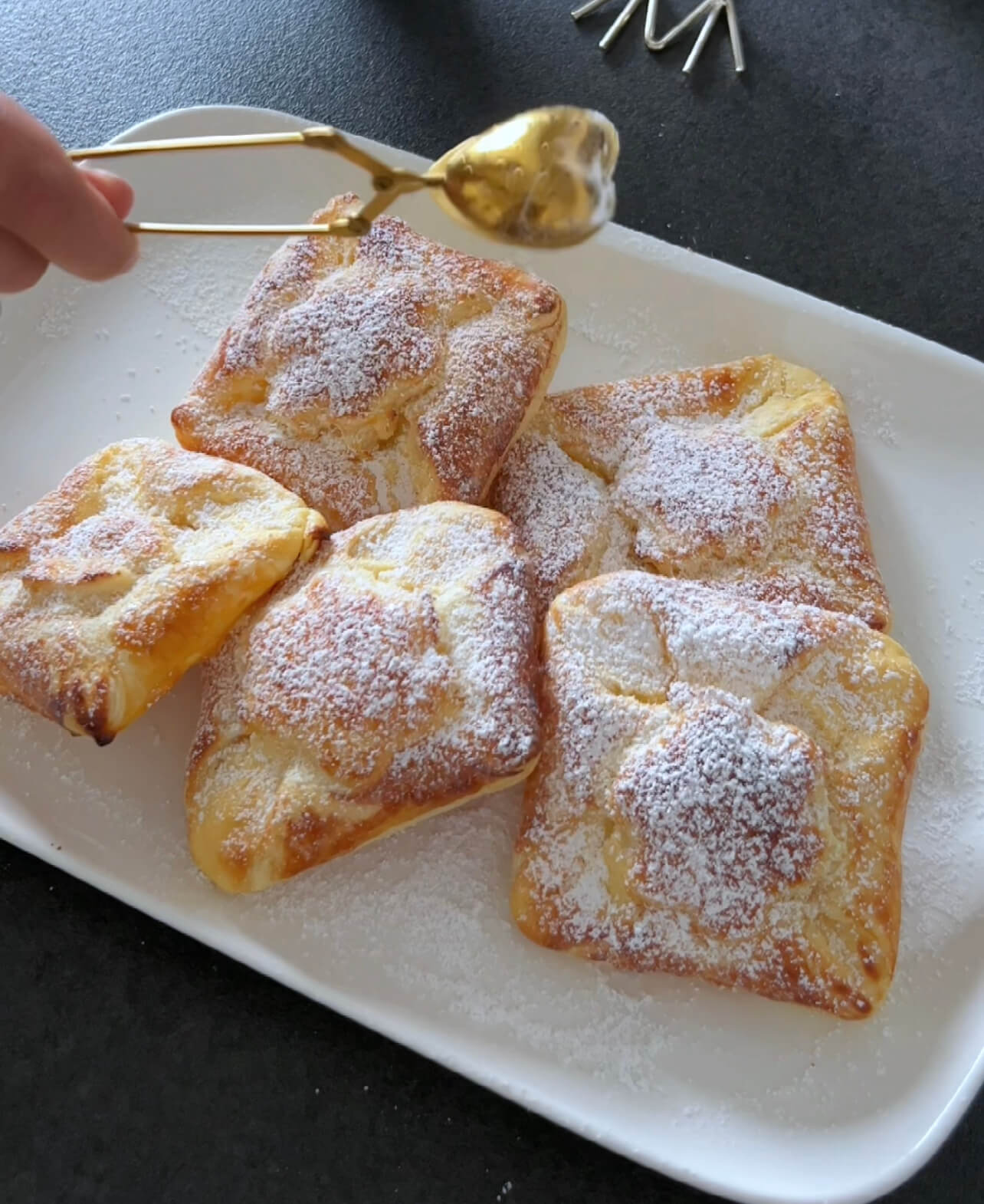 Image of Allow the quark pastries to cool slightly and dust them...