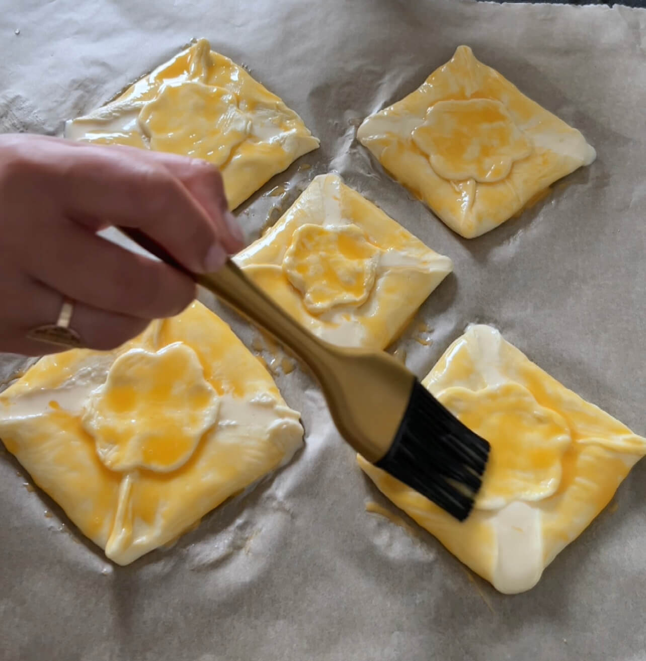 Image of Arrange the quark pastries on a baking sheet lined with...