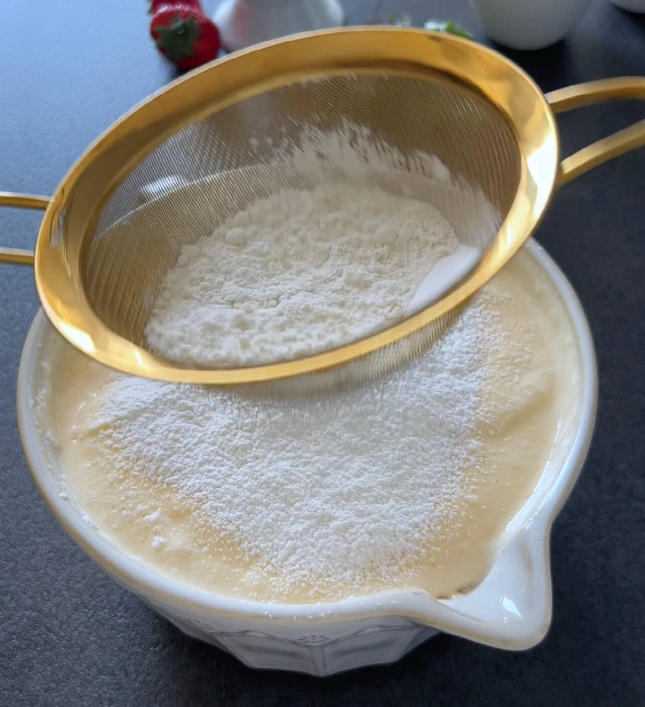 Image of Mix the flour and baking powder in another bowl.