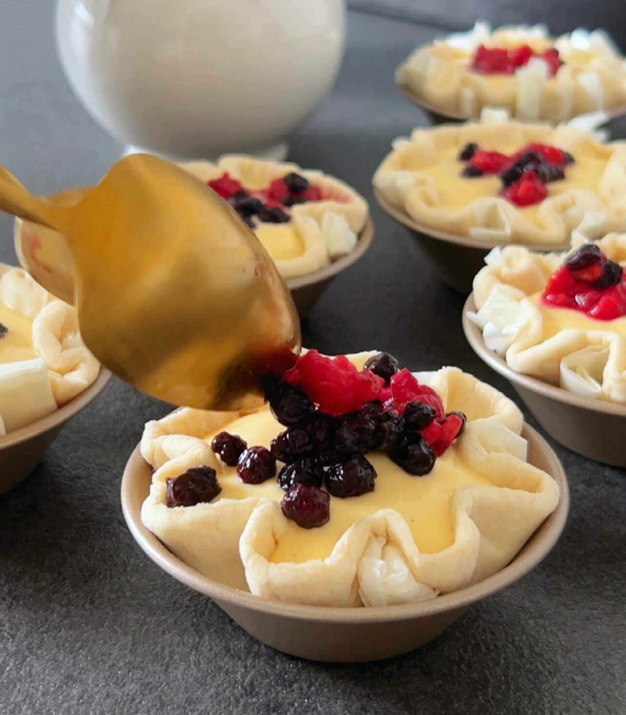 Image of Sprinkle about 1 teaspoon of frozen berries over the filling...