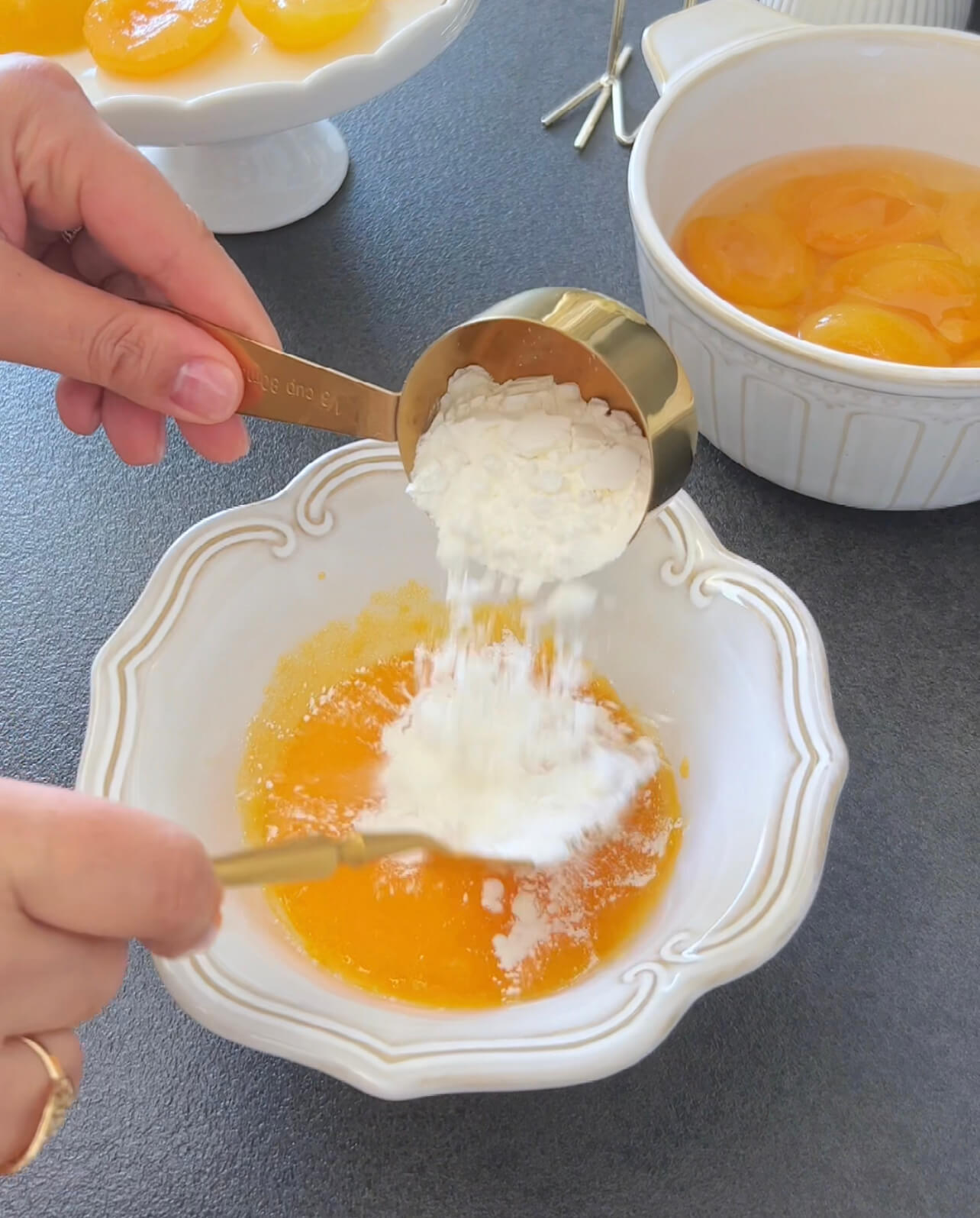 Image of Combine flour, sugar, and salt in a bowl. Mix with...