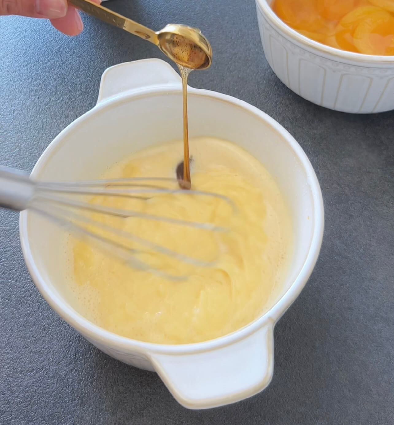 Image of Whisk egg yolks, sugar, and cornstarch together.