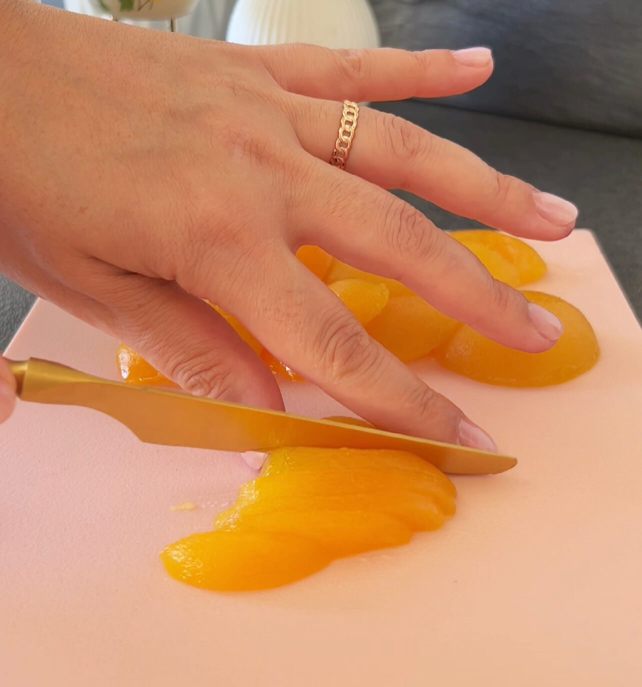 Image of Cut canned apricots into strips .