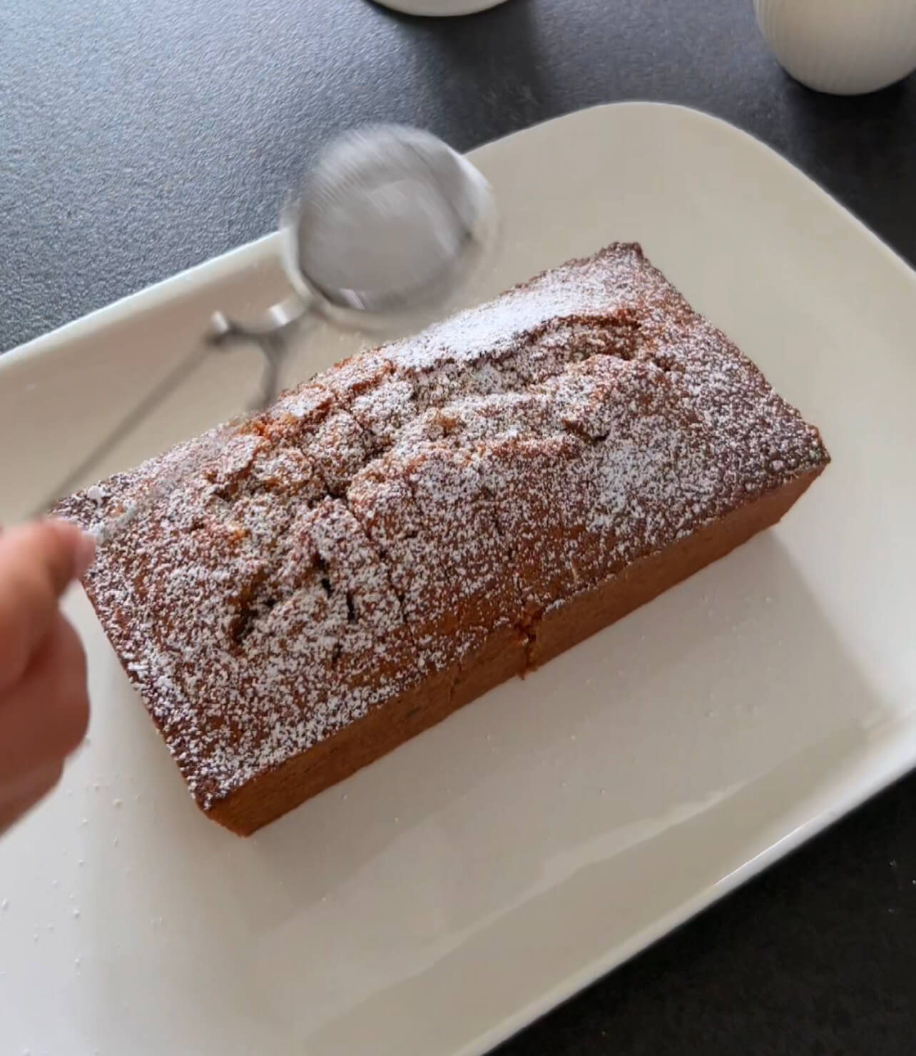 Image of Allow the cake to cool in the pan before gently...