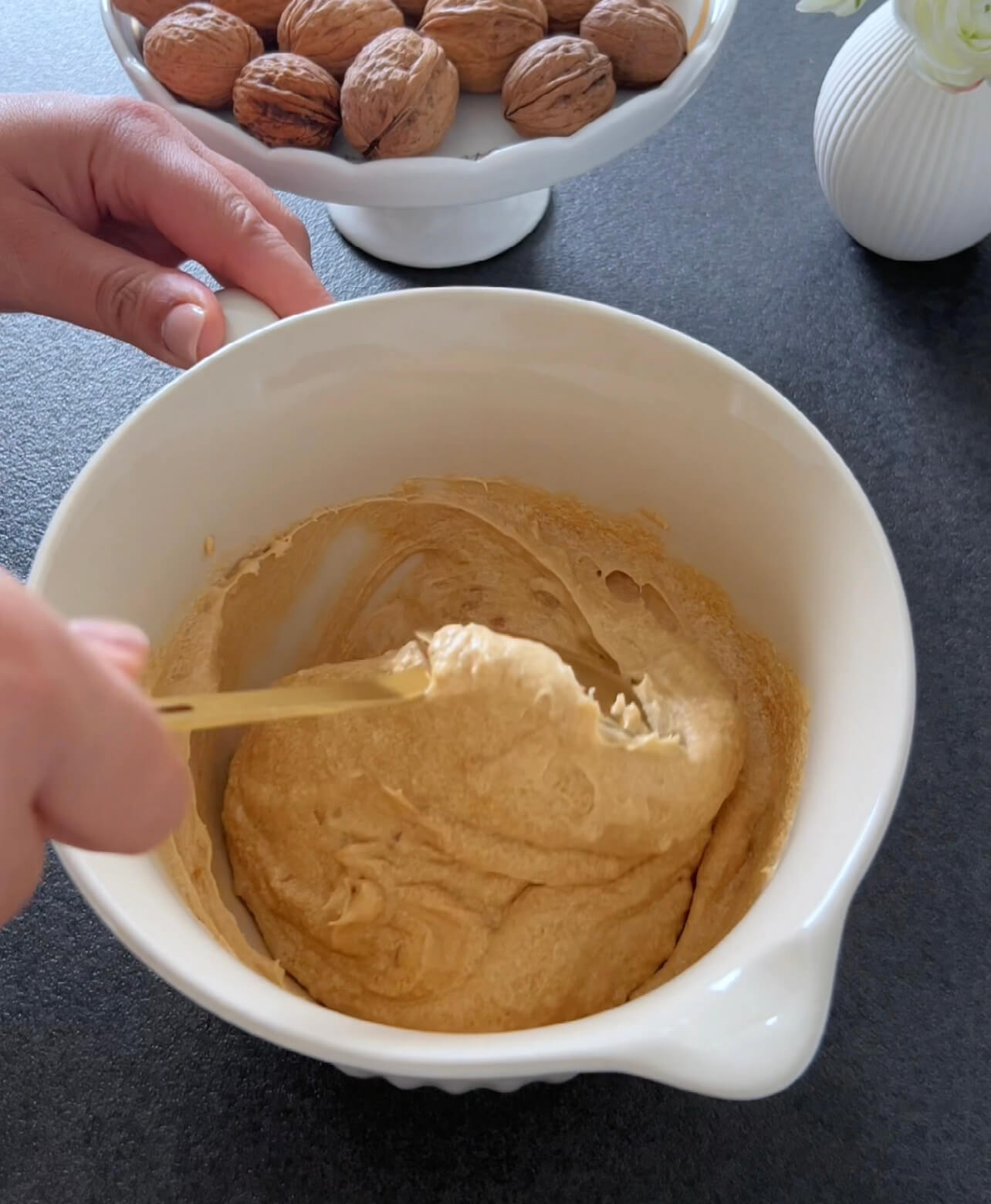 Image of In a separate bowl, mix the flour, baking powder, and...