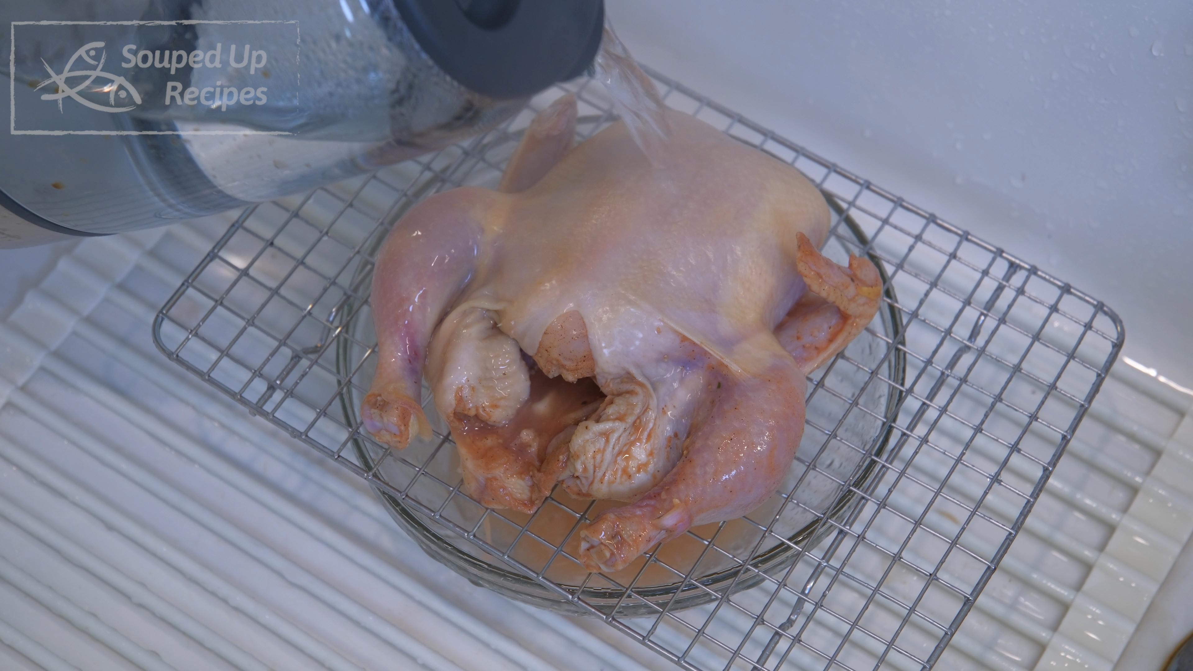 Image of Bring the Cornish hen to the sink with a rack...