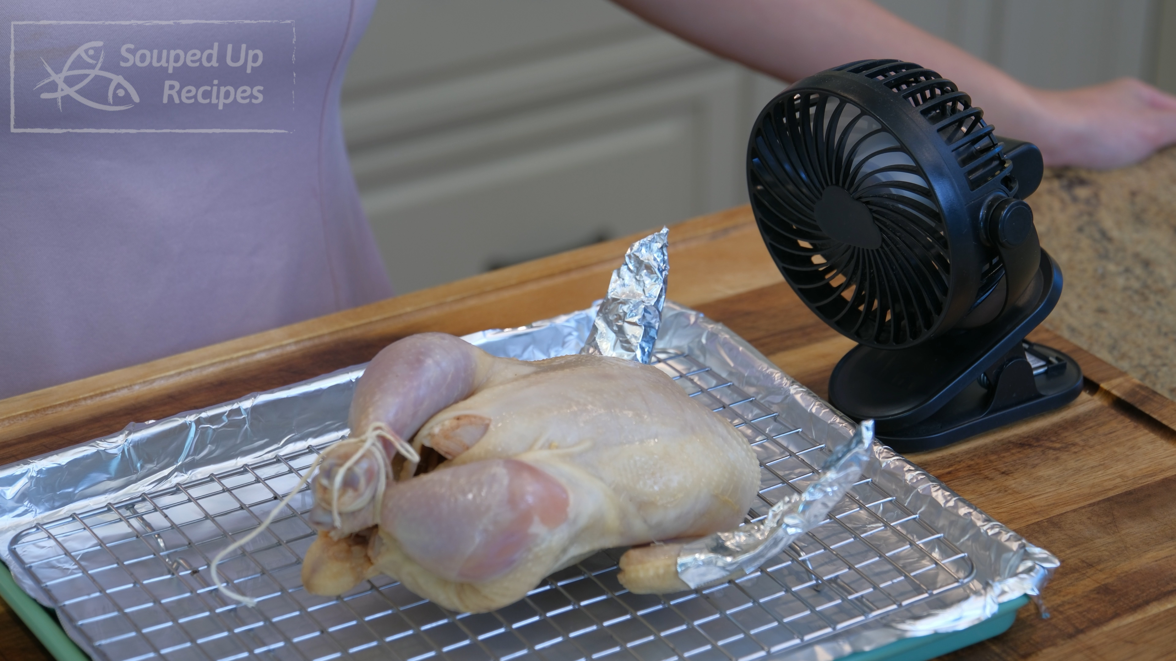 Image of Optionally, quickly dry the chicken skin with a small fan...
