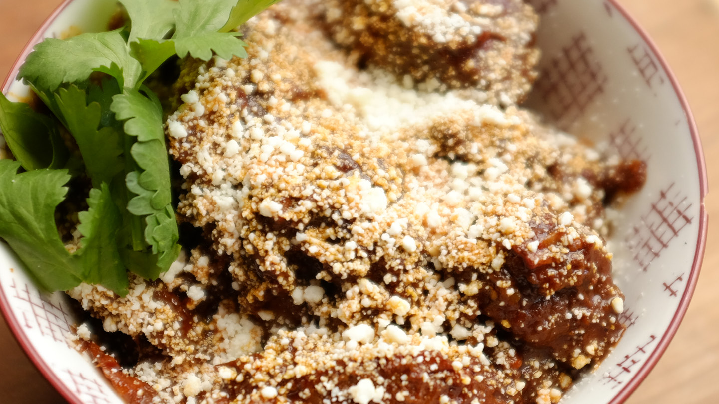 Image of Serve warm topped with cilantro, cotija cheese and flour tortillas.
