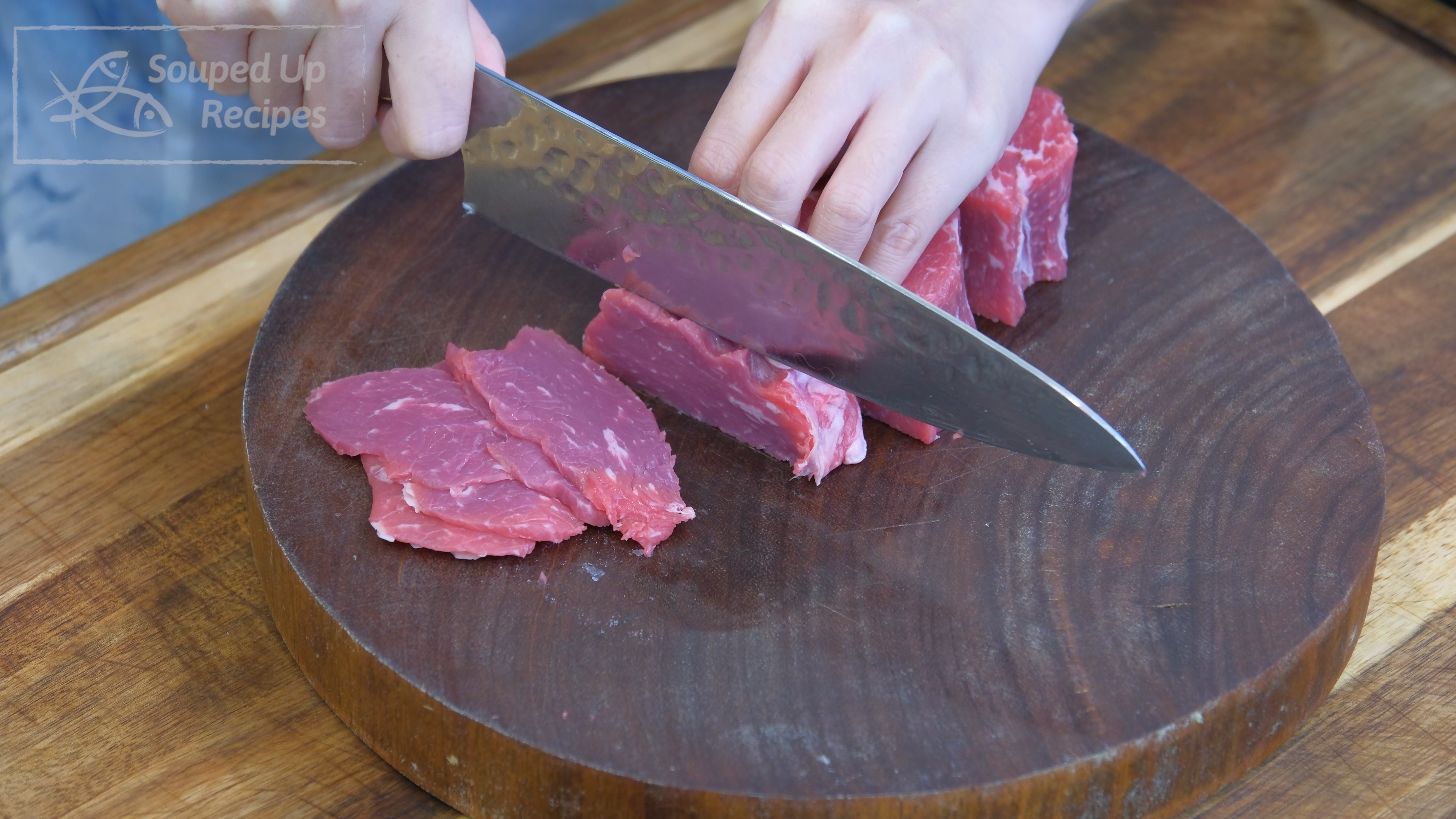 Image of Slice the beef into 1/8 of an inch thick slices....