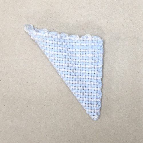 Image of To make a triangle, fold a Zoom Loom square in...
