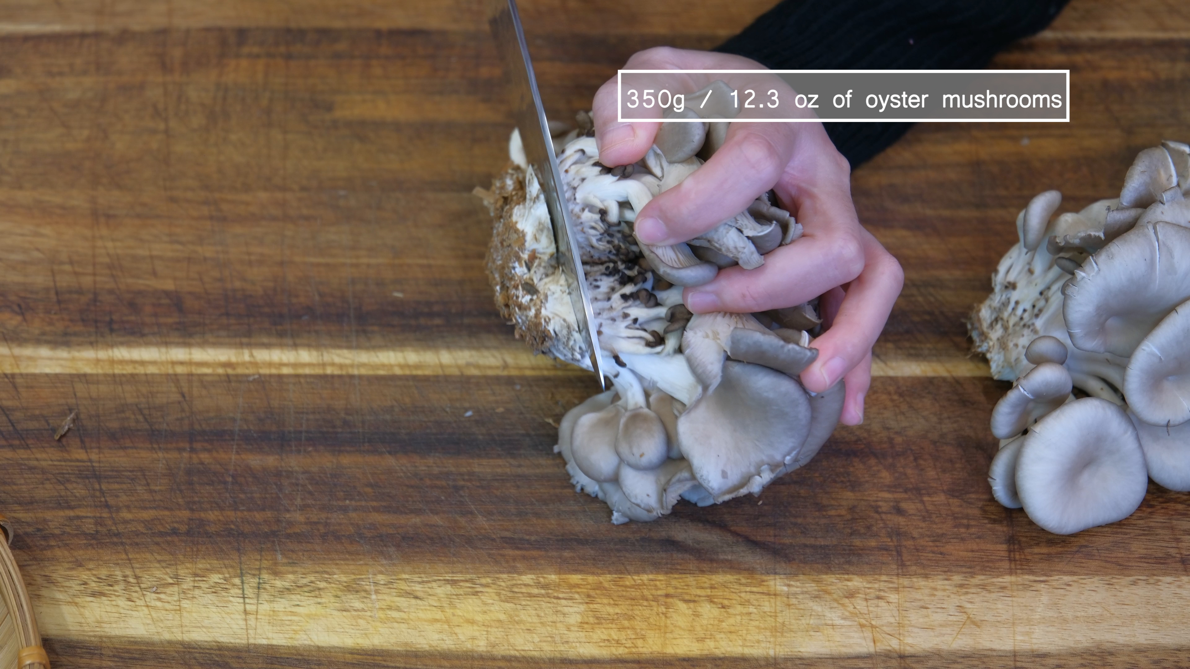 Image of Discard the end of the oyster mushroom where they contact...