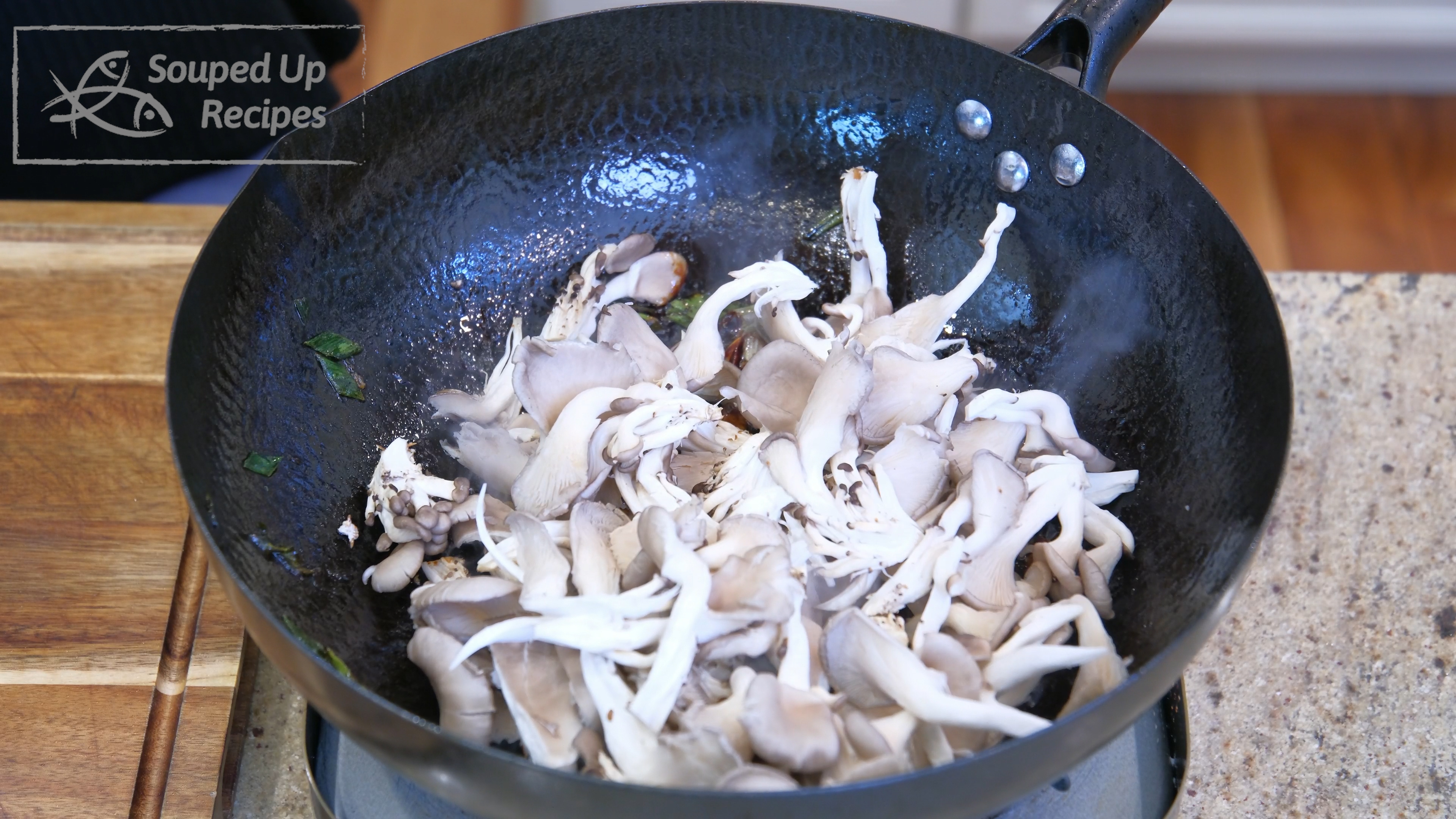 Image of Add the oyster mushrooms and stir over medium-low heat for...