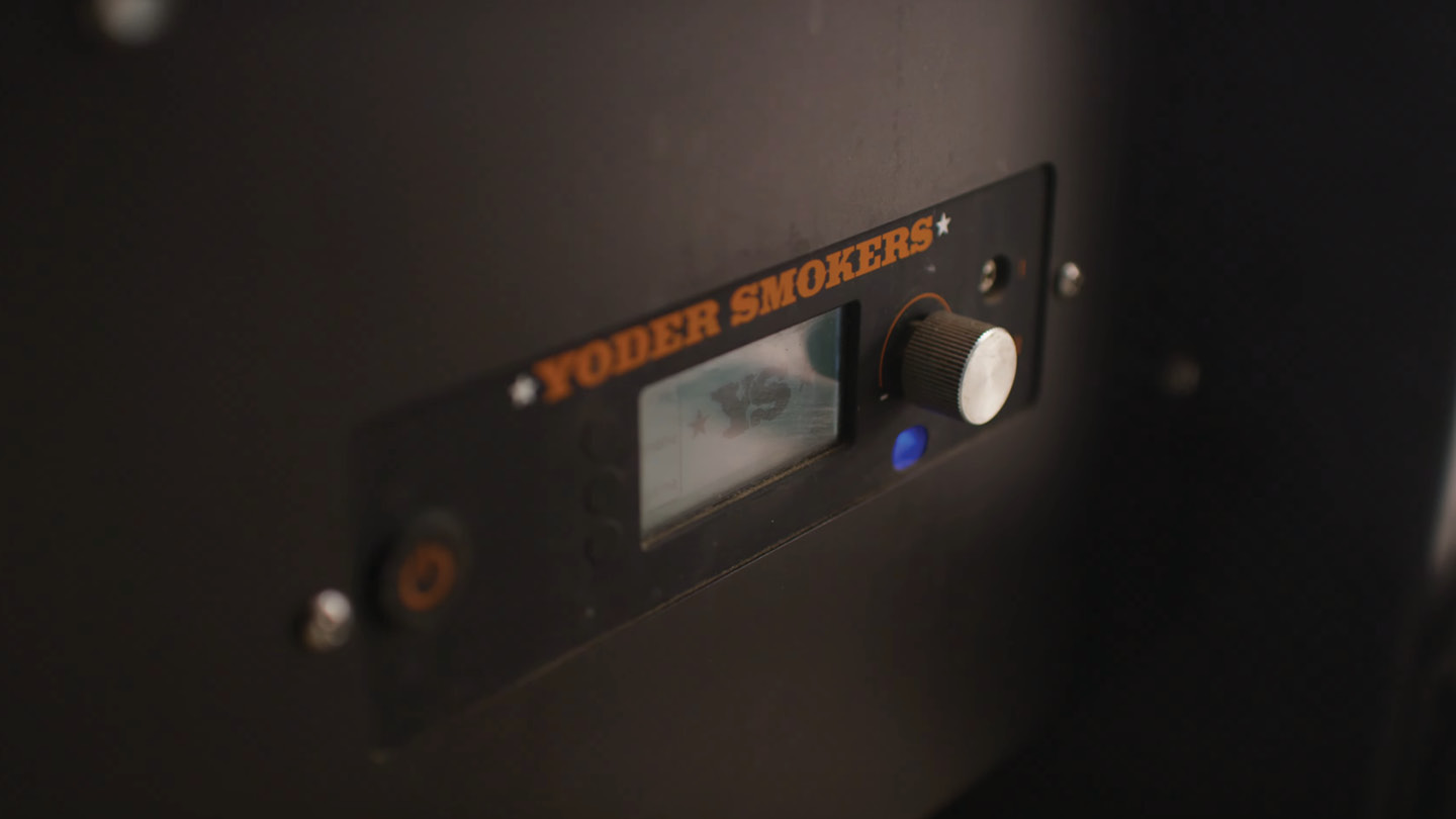 Image of Press the power button on the Yoder Smokers YS640s Pellet...