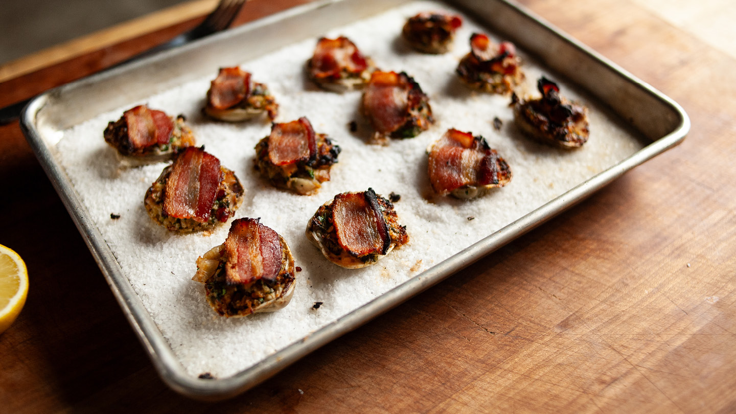 Image of Top each clam with a slice of bacon, cut to...