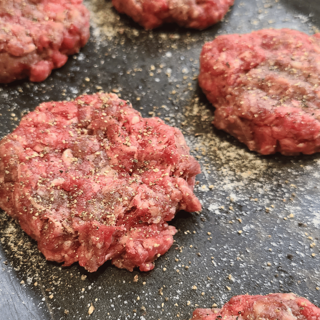Image of Divide the ground elk meat into 8 equal portions and...