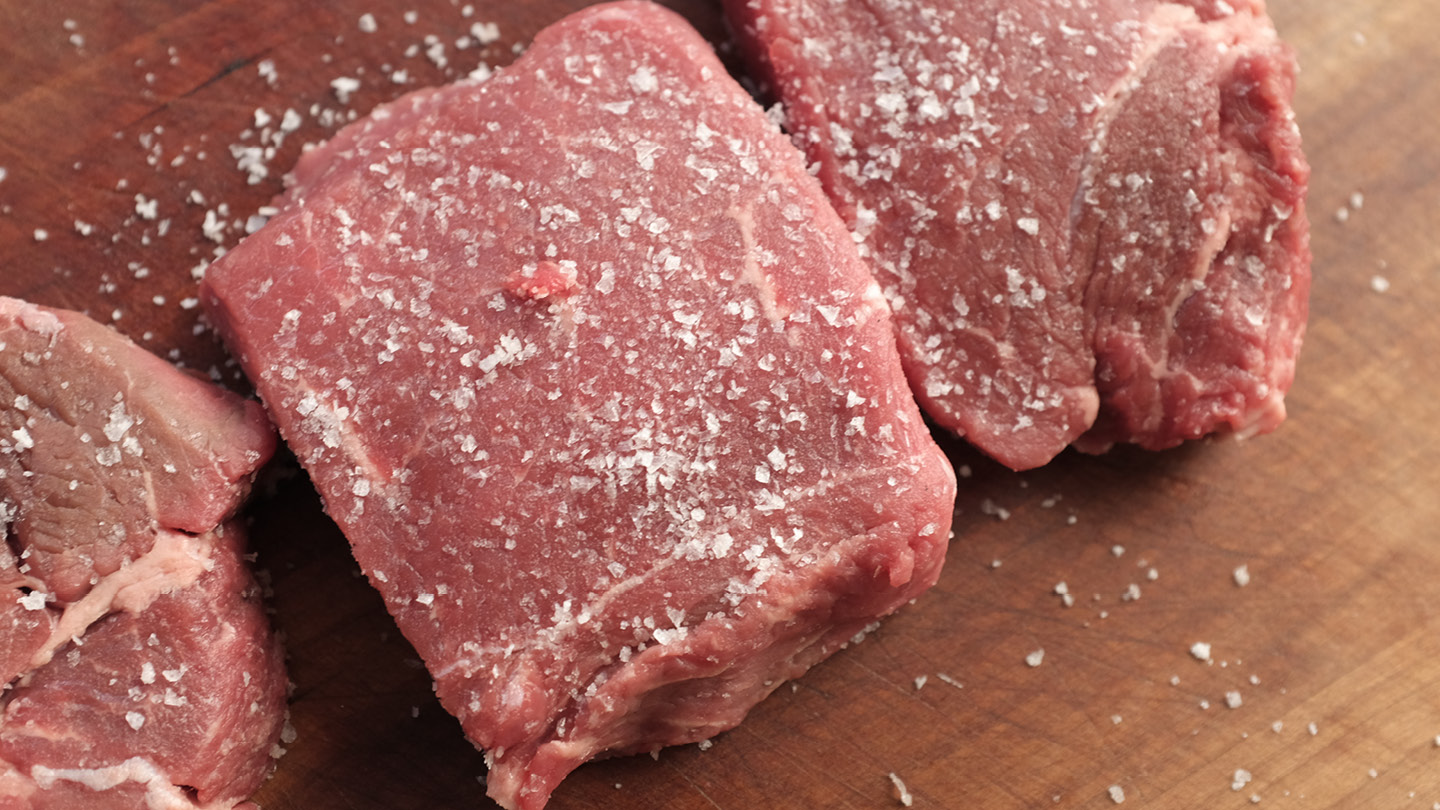 Image of To dry brine your steak, simply sprinkle kosher salt on...
