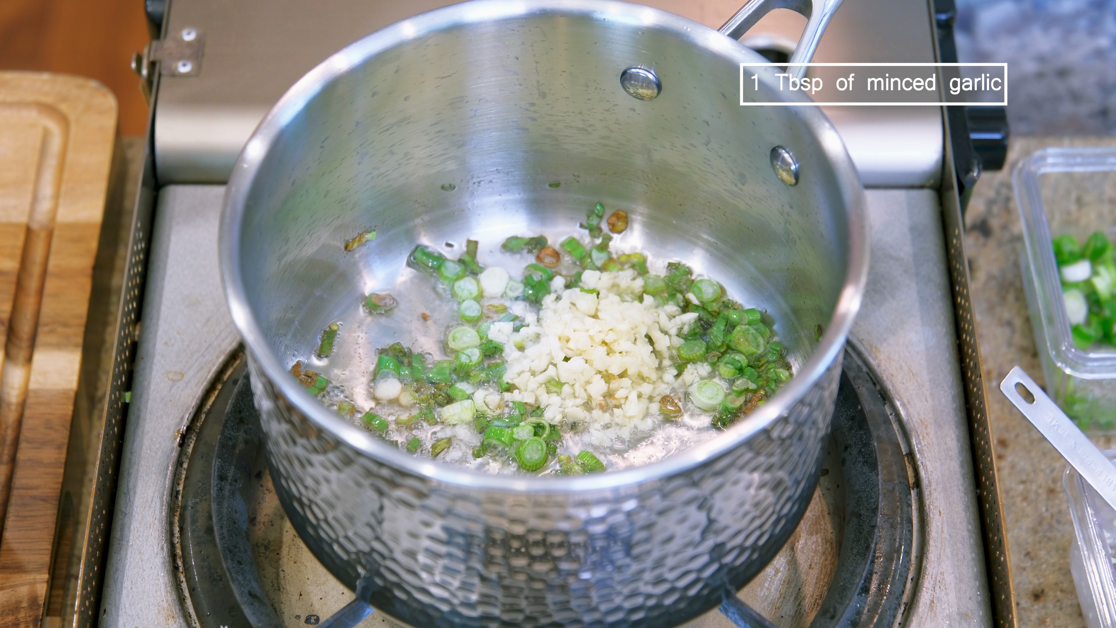 Image of Add minced garlic and keep stirring over medium-low heat until...