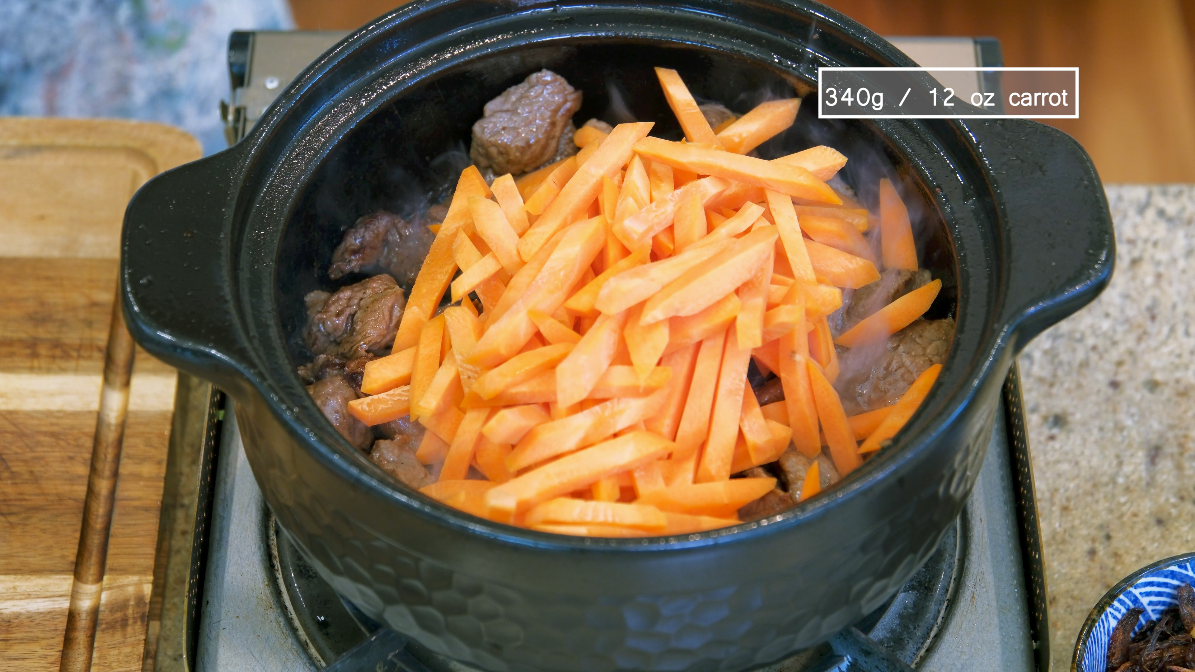 Image of Add the carrot sticks and keep mixing over high heat...