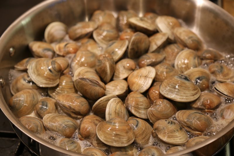 Image of Add the clams to the pot, cover and cook for...