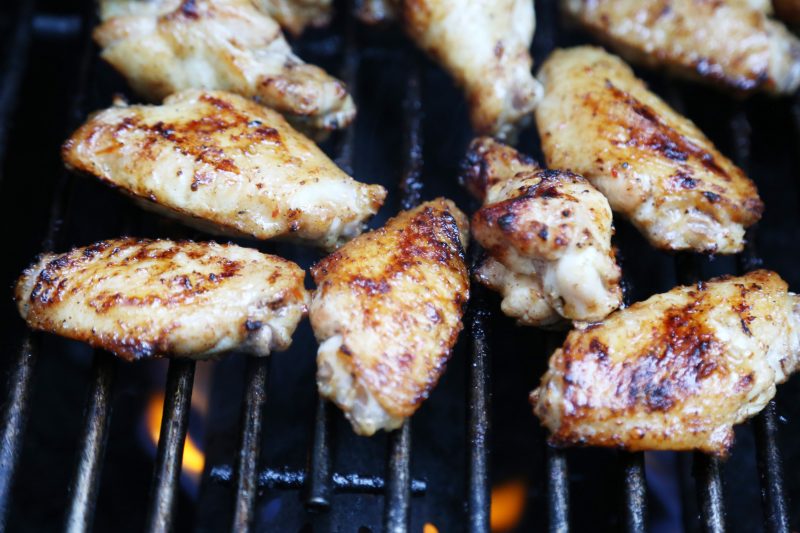 Image of Place the wings on the grill, just squeeze them all...