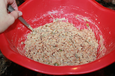 Image of In a large mixing bowl, combine all ingredients EXCEPT the...