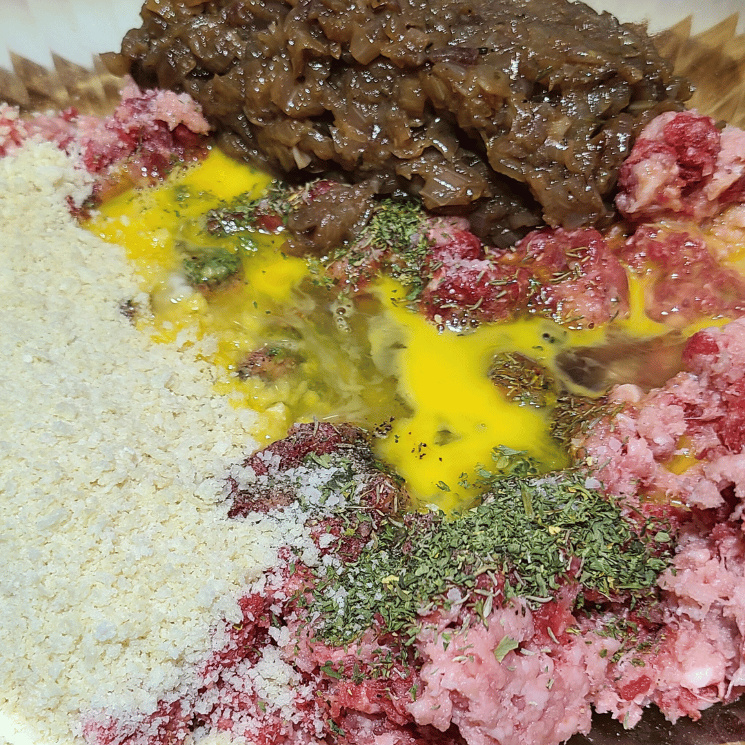Image of Combine the ground bison, ground boar, egg, panko, salt, and...