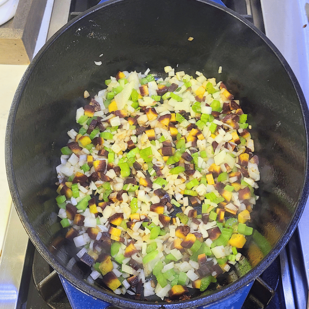 Image of Add the onions, carrots, and celery to the Dutch oven....