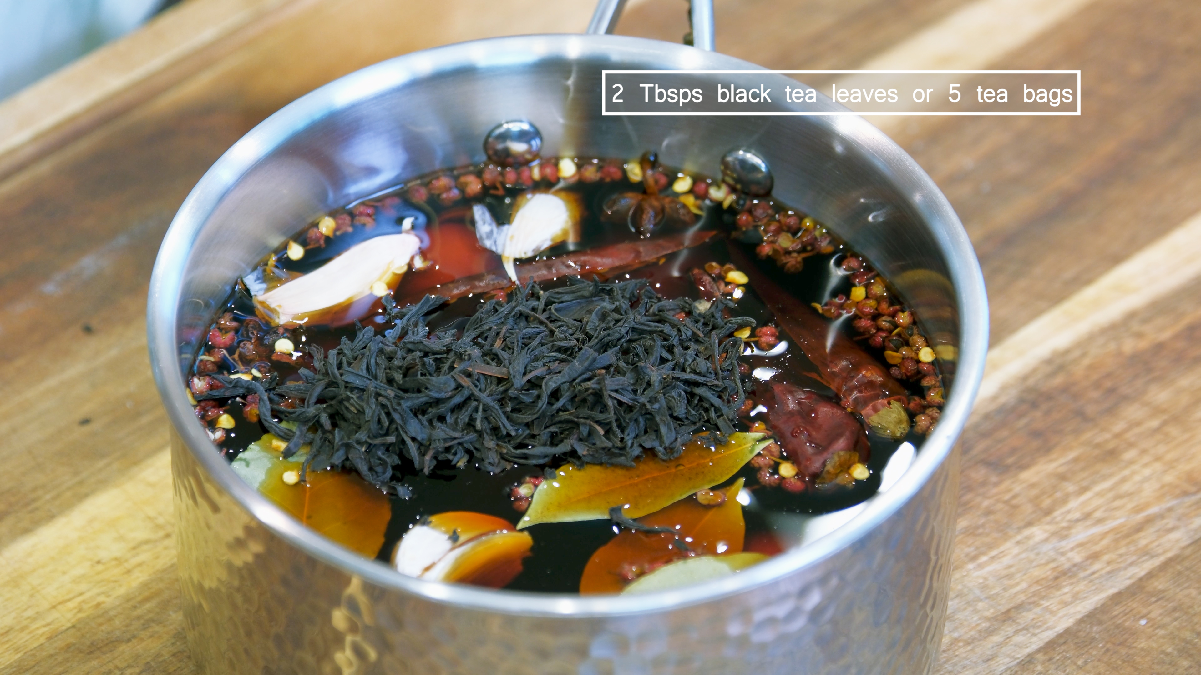 Image of Add the eggs, star anise, bay leaves, Sichuan peppercorns, cinnamon...