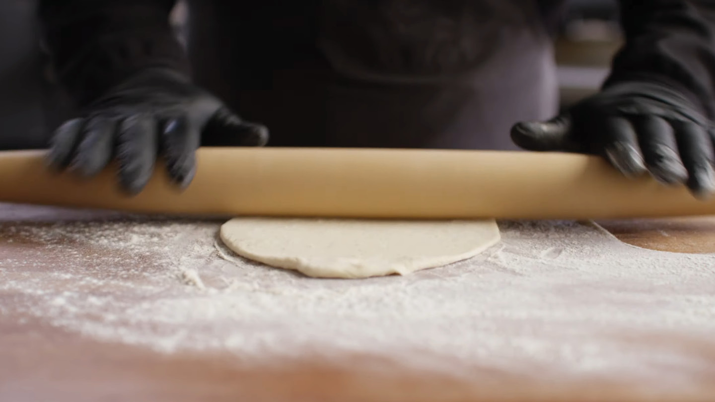 Image of Roll out your pizza dough until it’s about 6” in...