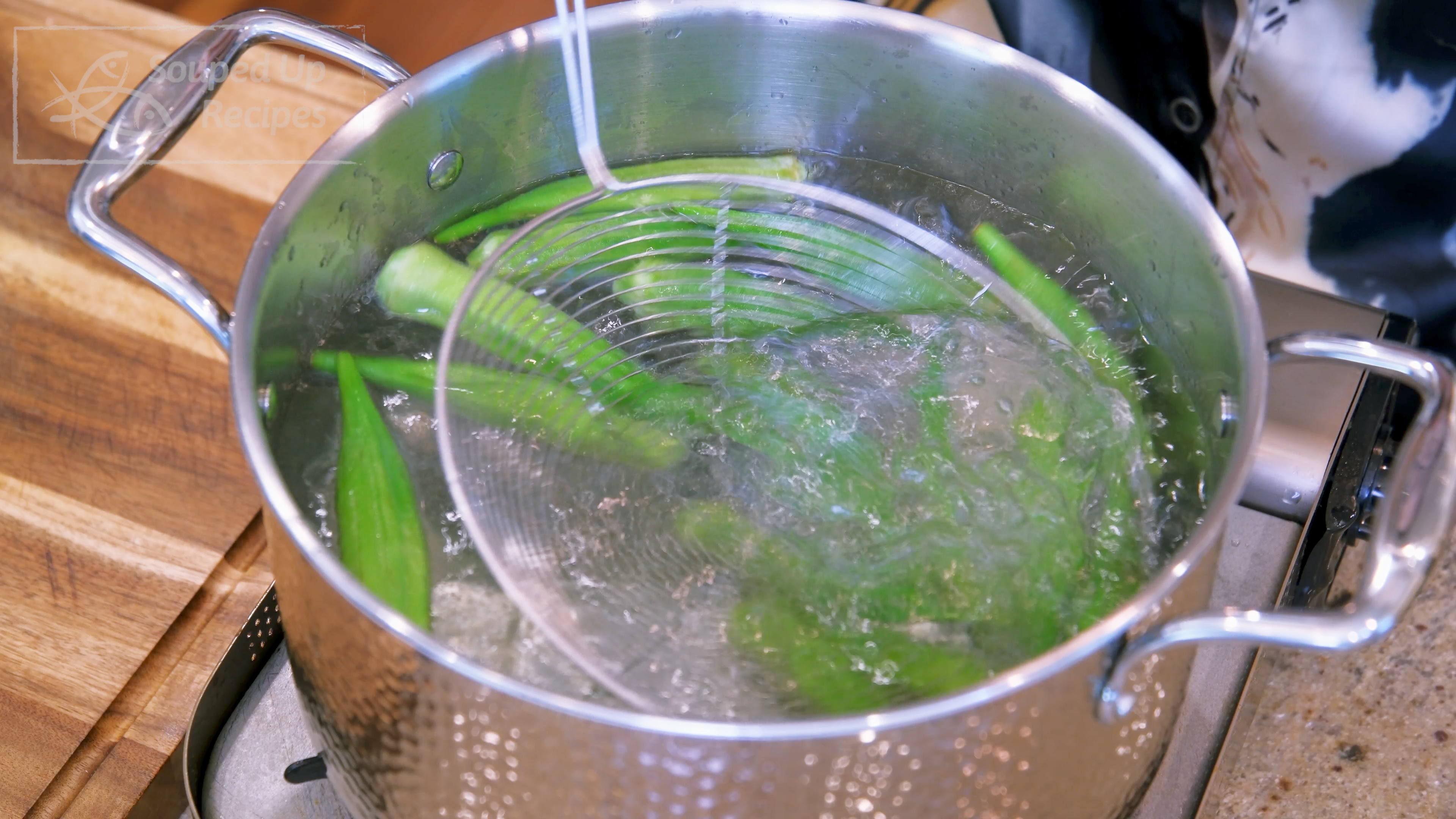 Image of Bring 2 liters of water to a boil. Add a...