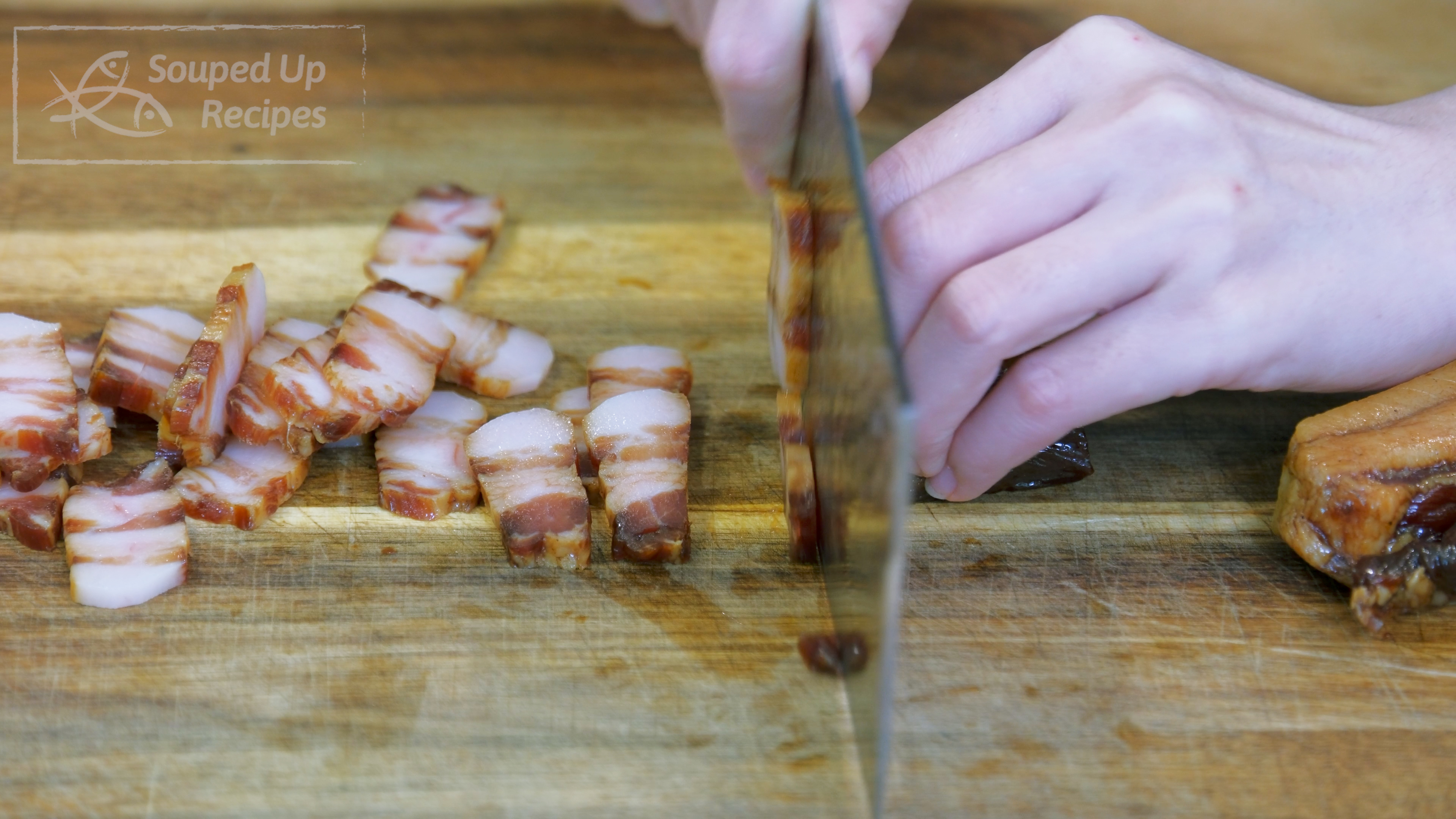 Image of Remove the tough skin from the Chinese cured bacon(AKA lap...