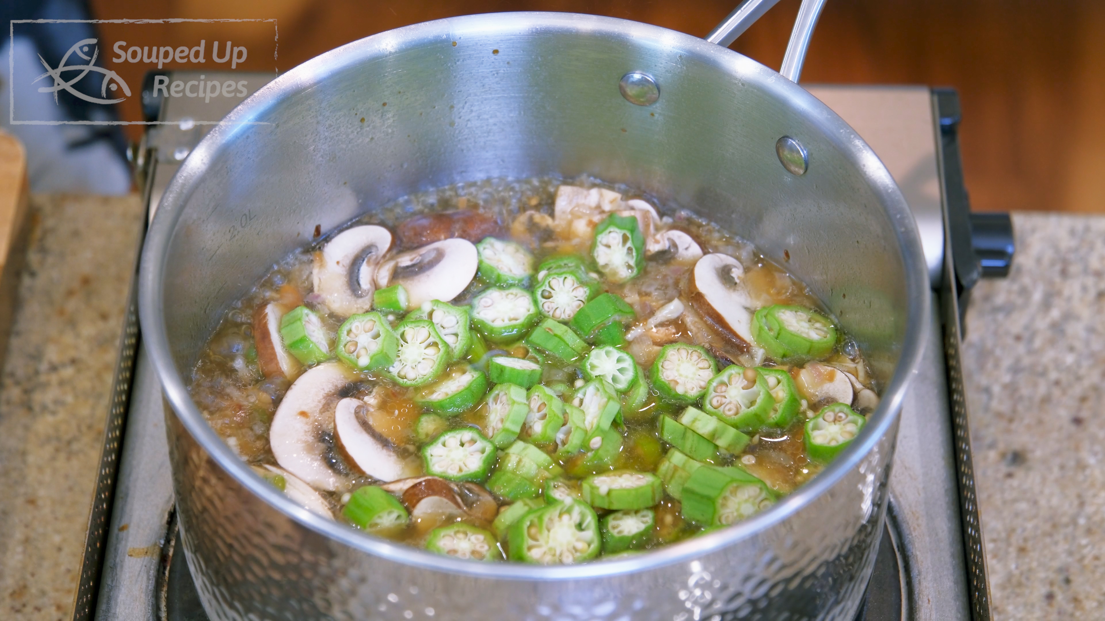 Image of Once the water comes to a boil, add the okra...