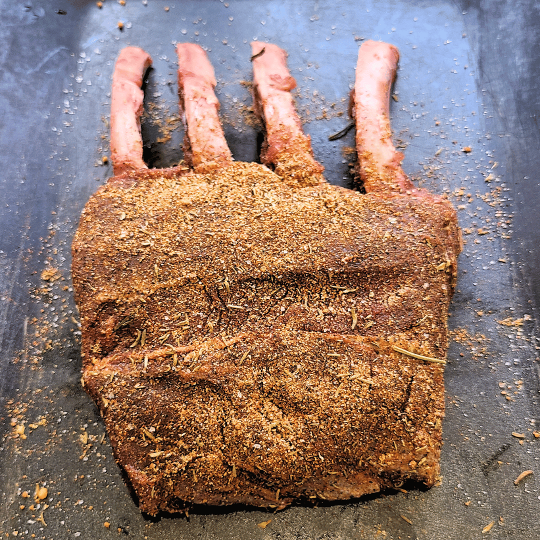 Image of Coat the elk rack generously with the dry rub, ensuring...