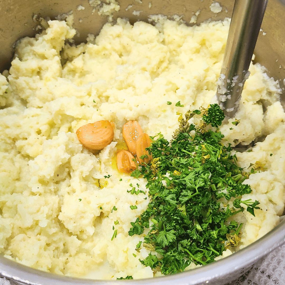Image of Add butter, salt, pepper, parsley, and smoked garlic with oil.