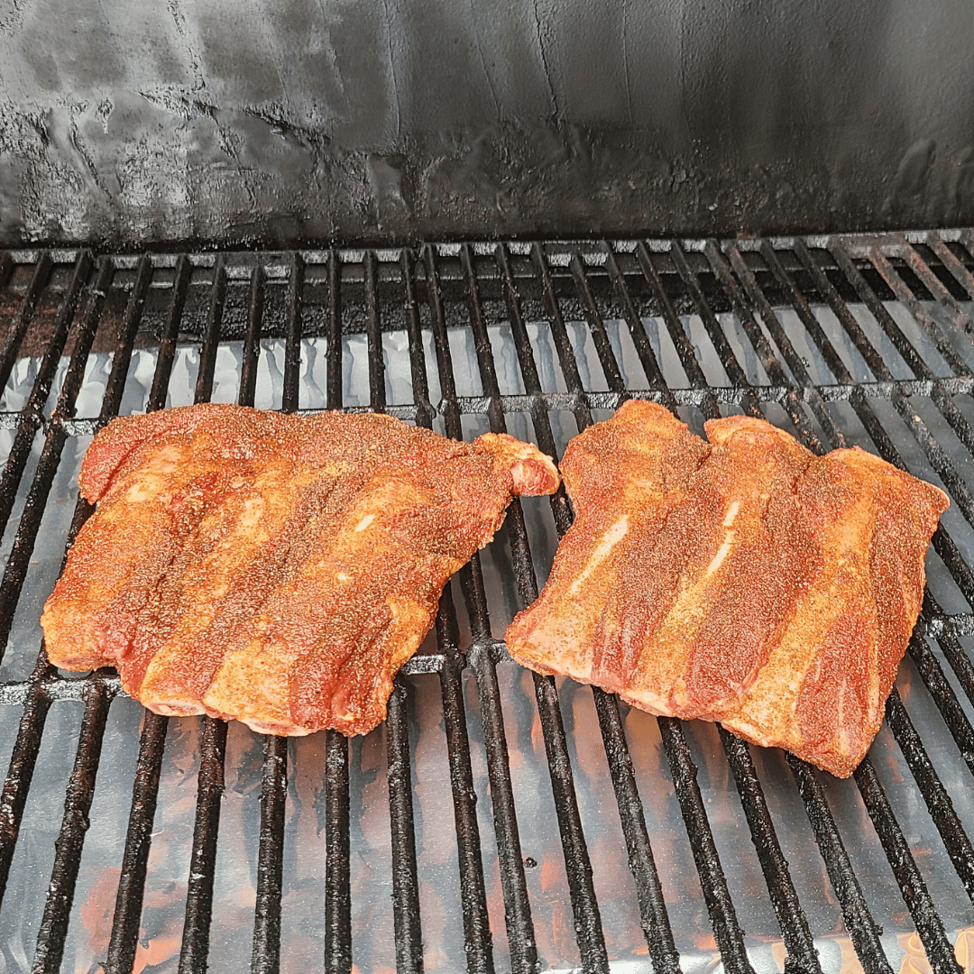 Image of Smoke the Ribs: Once the smoker is at the right...