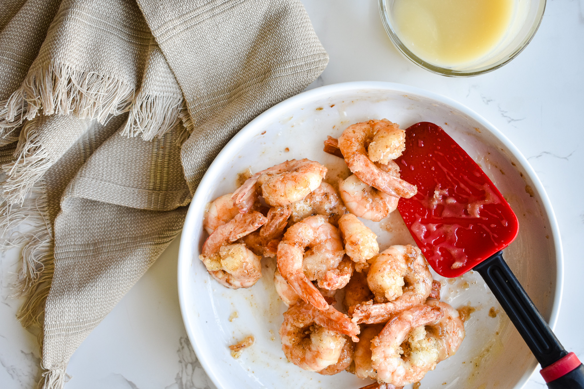 Image of Toss fried shrimp with the honey sauce. Top with candied...