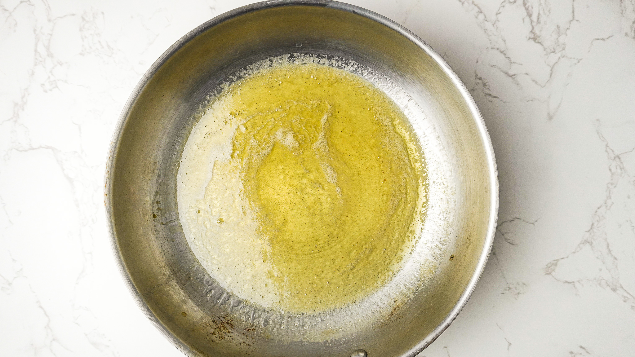 Image of In a small saucepan, melt the butter over low heat....