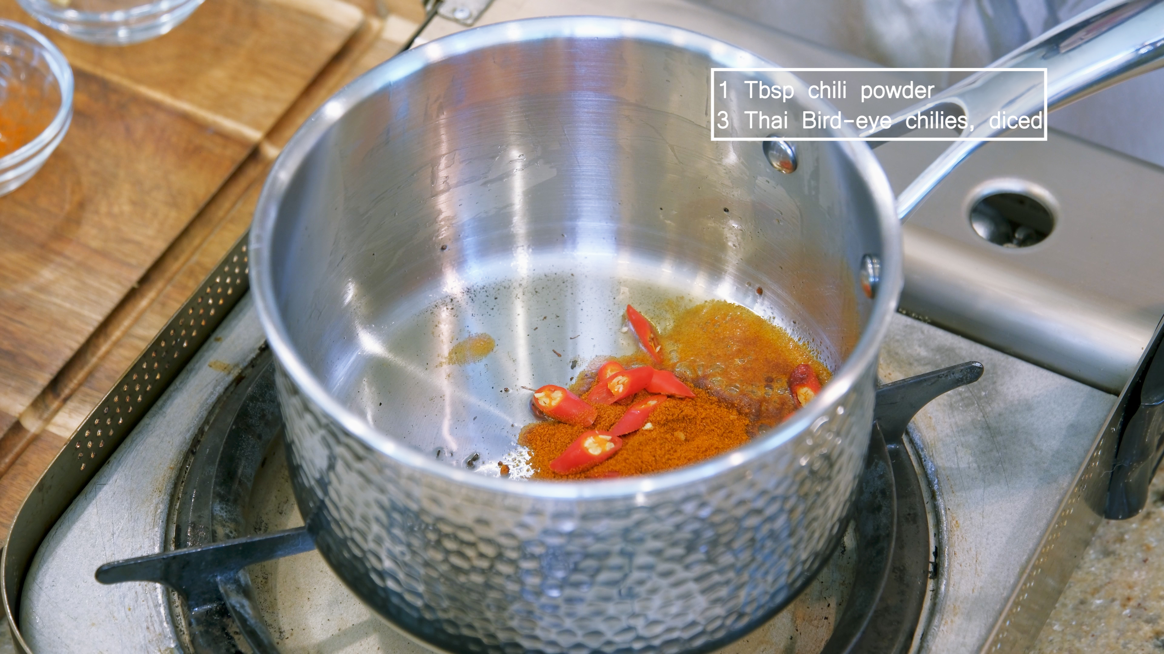 Image of To the saucepan, add 1 tbsp of chili powder and some diced...
