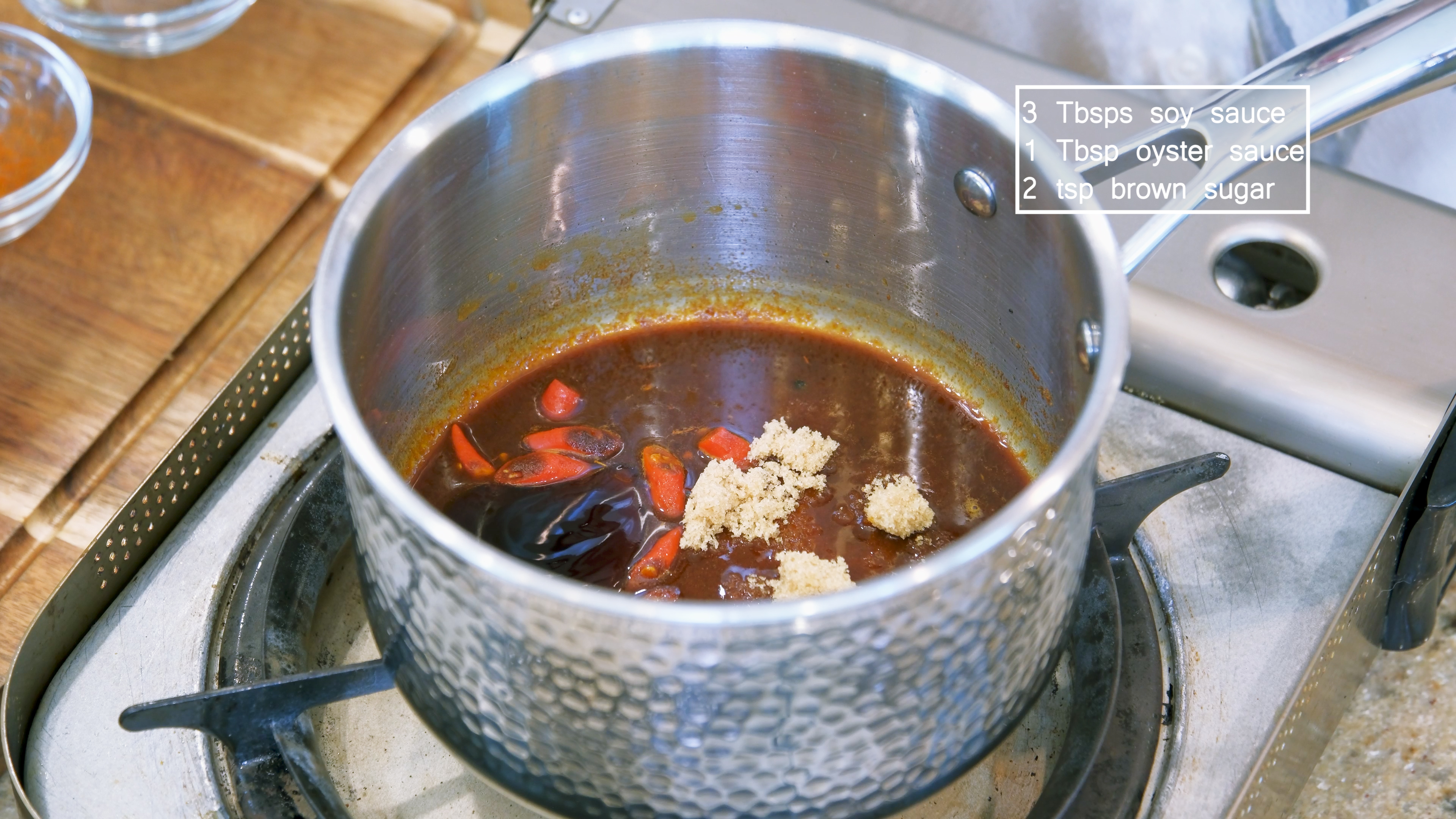 Image of Turn off the heat and add 3 Tbsp of soy sauce, 1 Tbsp of...
